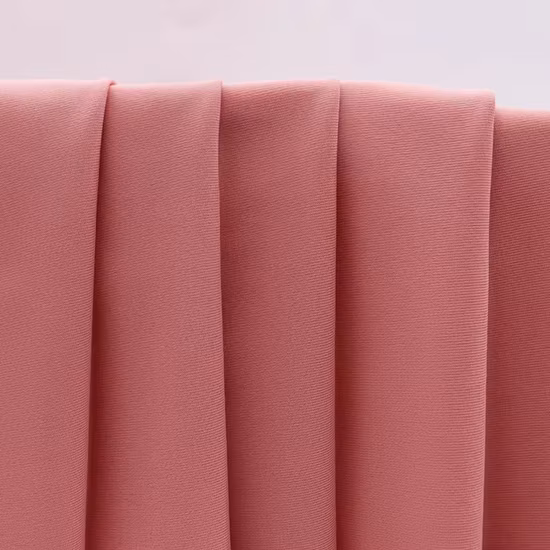 Comercio al por mayor personalizado 83% nailon 17% spandex Upf 50+ tejido elástico para trajes de baño de poliamida elastano de 4 vías